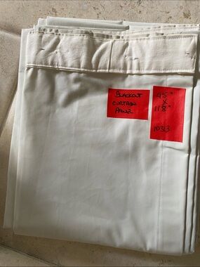 Blackout curtain panel 45 inches wide by 118 inches long, ecru color